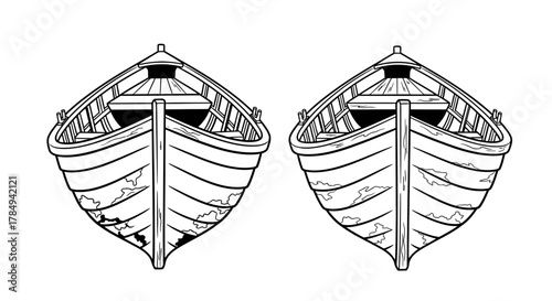 two traditional wooden boats floating side by side on calm waters