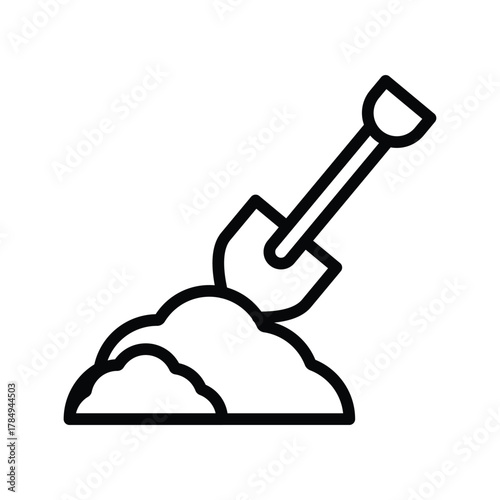 Shovel in a pile of dirt