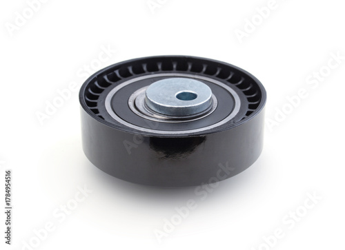 Timing belt tension roller isolated on white.