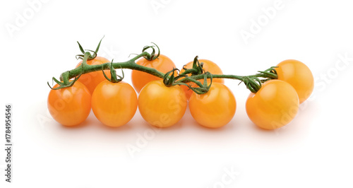 Ripe cherry tomatoes isolated on white.