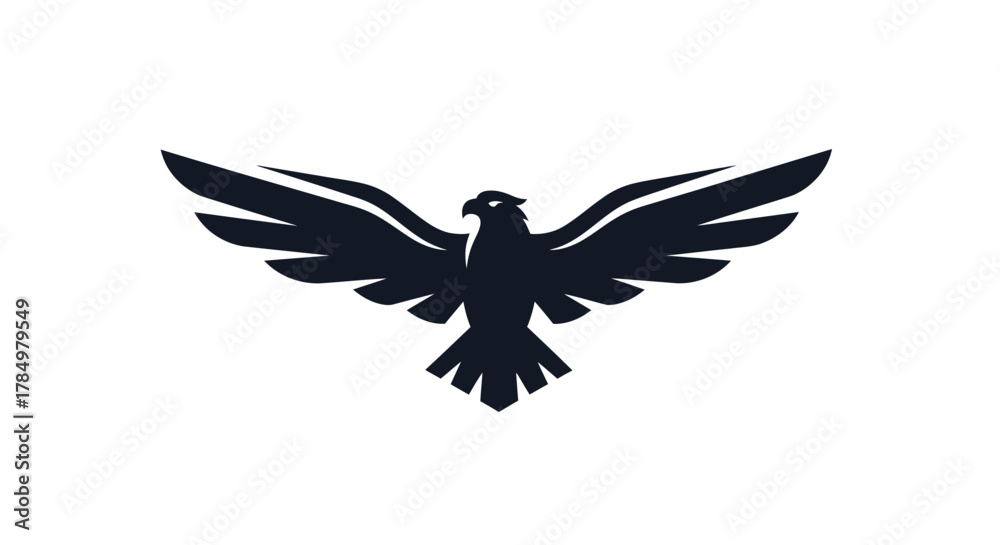 Obraz premium Majestic eagle silhouette with widespread wings evoking freedom and power for design