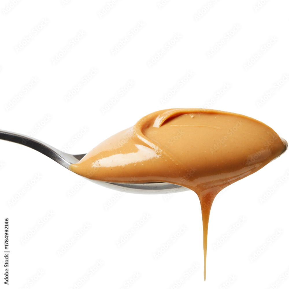 Fototapeta premium Creamy Peanut Butter Against Black