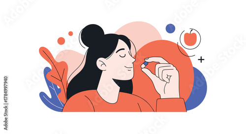 A woman is carefully holding a small blue pill between her fingers.