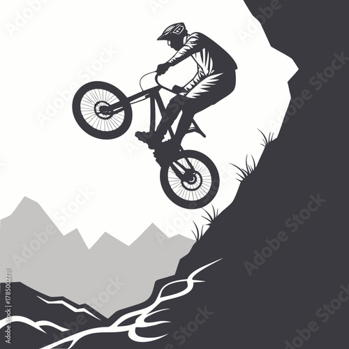 Mountain biker performing a stunt on a rocky cliff