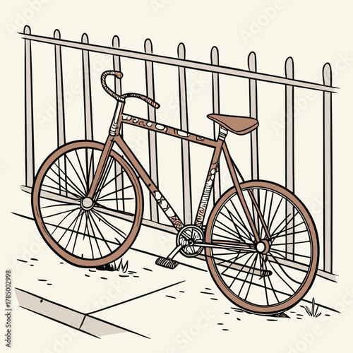 Vintage bicycle leaning against a metal fence on a city sidewalk