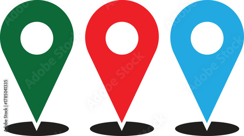 A set of three colorful map location pins in green, red, and blue on a white background.