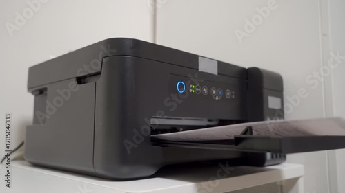 Important Document is Ready: Printer Whirs and Feeds Paper with Purpose