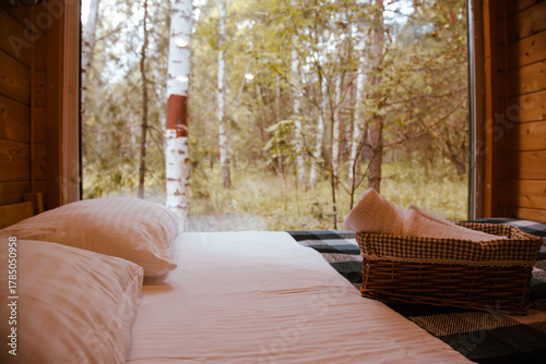 A house with a window view of the forest. Outdoor recreation. Morning. Glamping. Meditation. Alone with nature