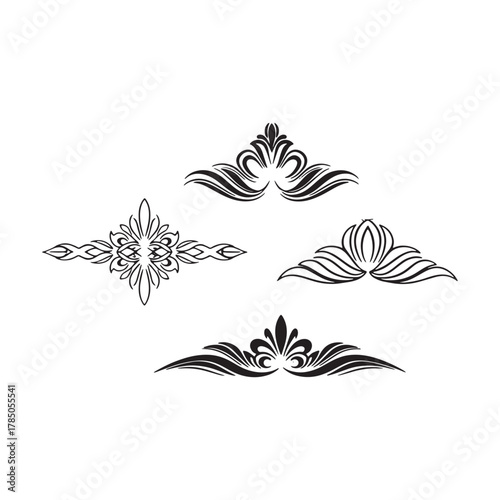 Four black decorative ornamental elements with varied designs