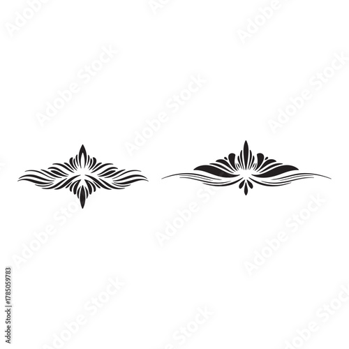 Two Black Decorative Flourish Ornaments on White Background