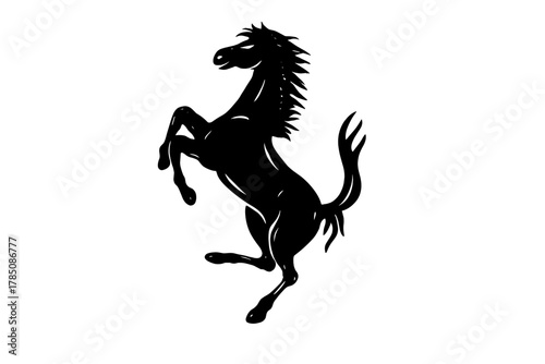 Powerful black silhouette of a rearing horse standing on hind legs