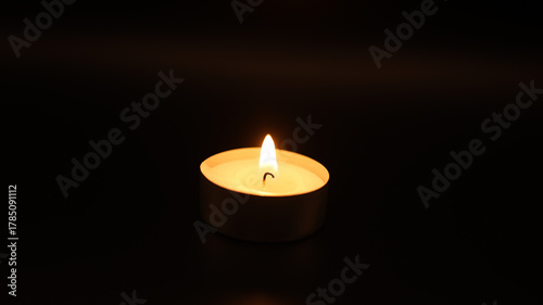 candle on black background