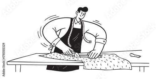 Smiling male tailor in an apron measures fabric with a ruler and chalk on a work table, using a sewing tape draped around his neck.