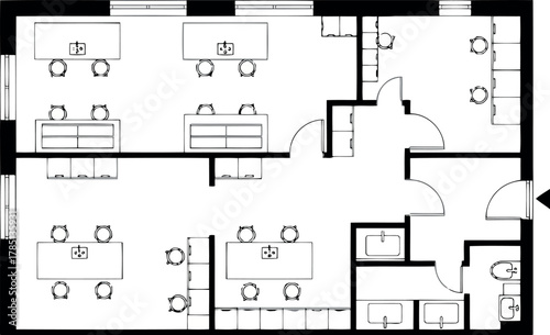 Floor plan of an office space with cubicles, meeting rooms, and restrooms