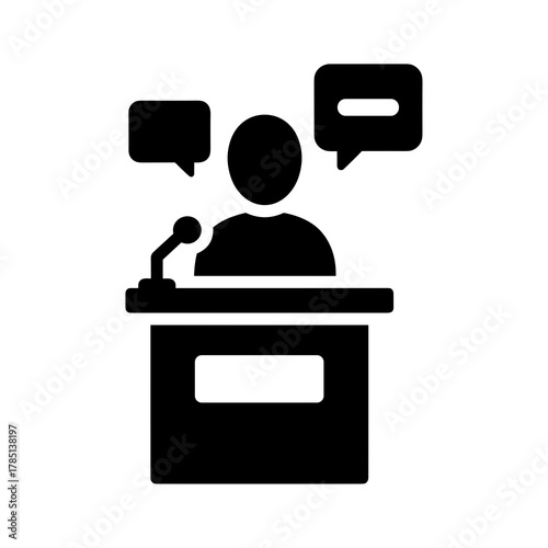 Person speaking at a podium with a microphone and two speech bubbles in a black and white drawing style icon