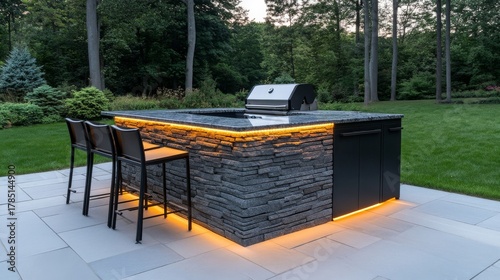 Outdoor Kitchen Island with Stone Veneer, BBQ and Bar Stools, backyard , landscape