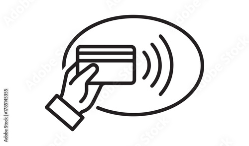 Hand holding credit card for contactless payment with wireless signal