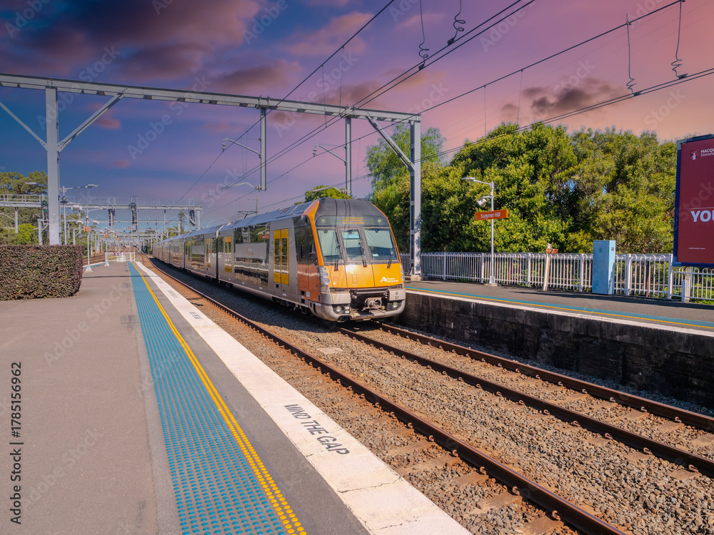 Naklejka premium Passenger Train going through Summer Hill train station a suburban Sydney train Station NSW Australia
