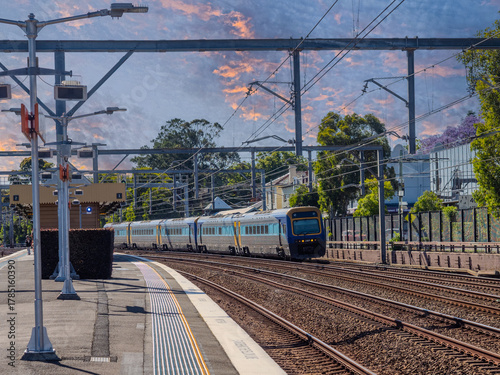 Photography Passenger Train going through Summer Hill train station a suburban Sydney train