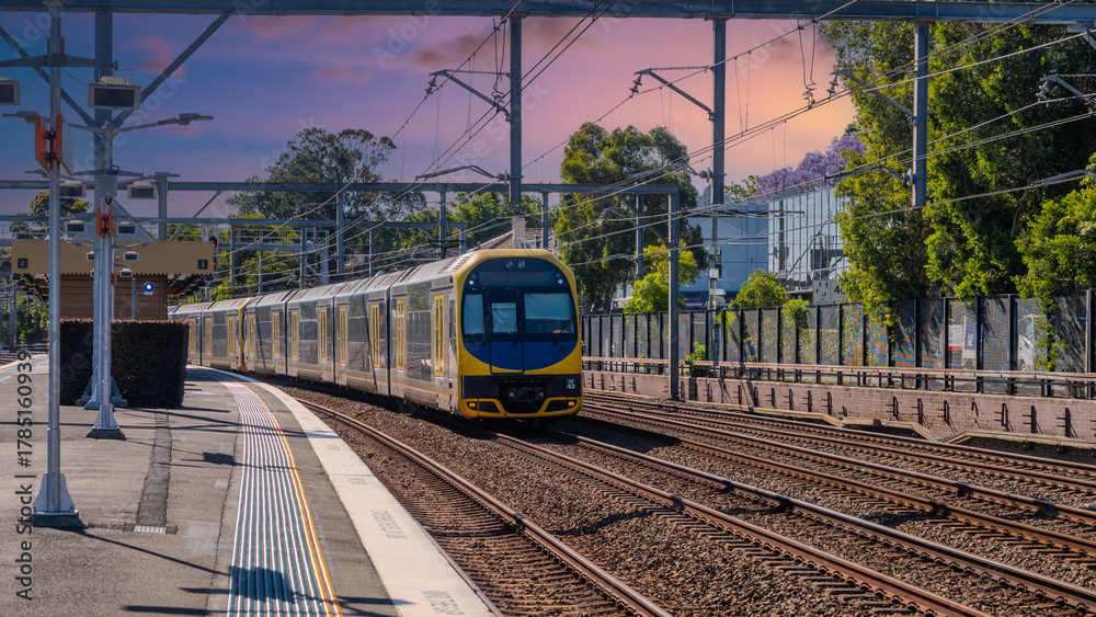 Naklejka premium Passenger Train going through Summer Hill train station a suburban Sydney train Station NSW Australia