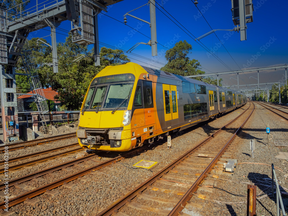 Fototapeta premium Passenger Train going through Summer Hill train station a suburban Sydney train Station NSW Australia