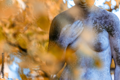Naked female statue hold her breast symbol of breast cancer