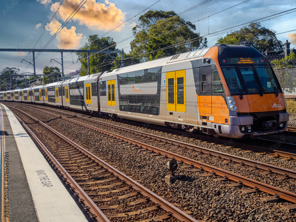 Fototapeta premium Passenger Train going through Summer Hill train station a suburban Sydney train Station NSW Australia