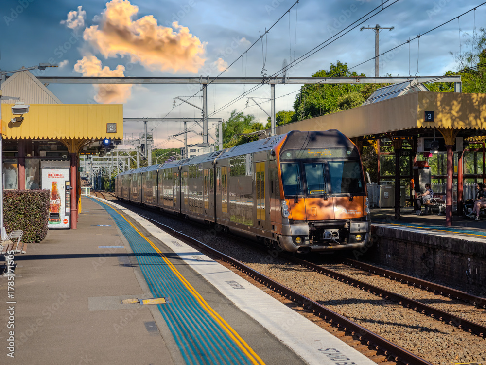 Naklejka premium Passenger Train going through Summer Hill train station a suburban Sydney train Station NSW Australia