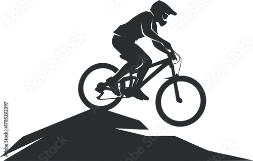 Dynamic silhouette vector illustration of a mountain biker jumping off a rocky terrain, perfect for sports and adventure designs