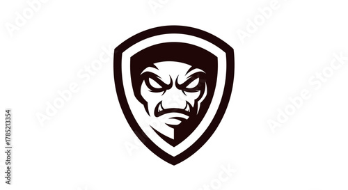 Canvas-taulu Bold shield emblem featuring a fierce face silhouette on white background