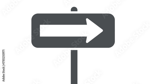A dark gray signpost with a white arrow pointing right