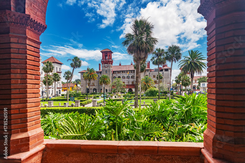 Quadro su tela Flagler College historic building with red arches and palm trees in Florida
