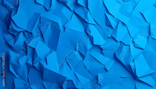 Fototapeta Naklejka Na Ścianę i Meble -  Abstract phantom blue wallpaper background. Crumpled paper texture, deep ocean color, origami. White tone