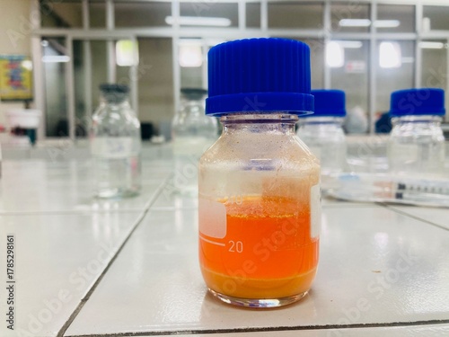 Bright orange liquid in laboratory flask