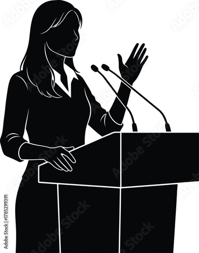 Silhouette of Woman Speaking at Podium with Microphones