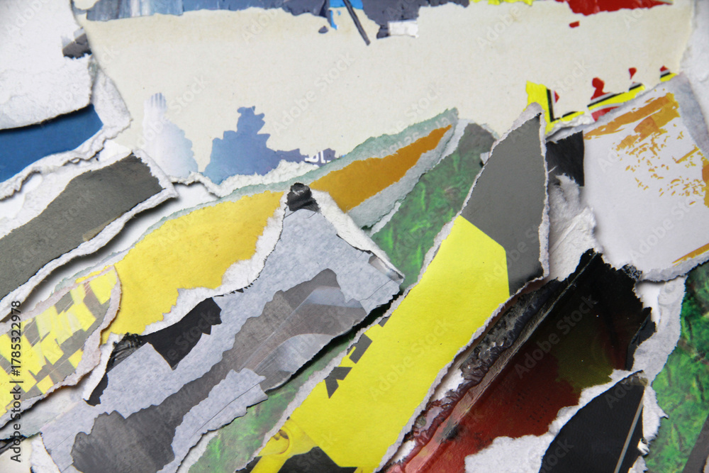 Fototapeta premium Multicolored poster paper, torn into numerous pieces.