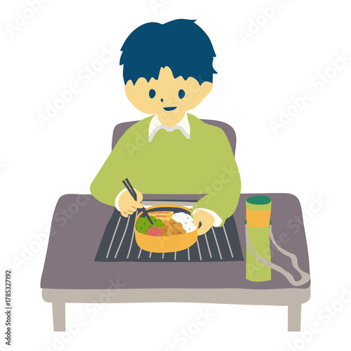 お弁当を食べる男子