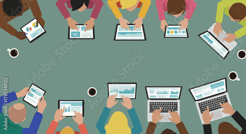 Business team analyzing data on tablets and laptops collaborating at a conference table demonstrating teamwork and strategy for project planning