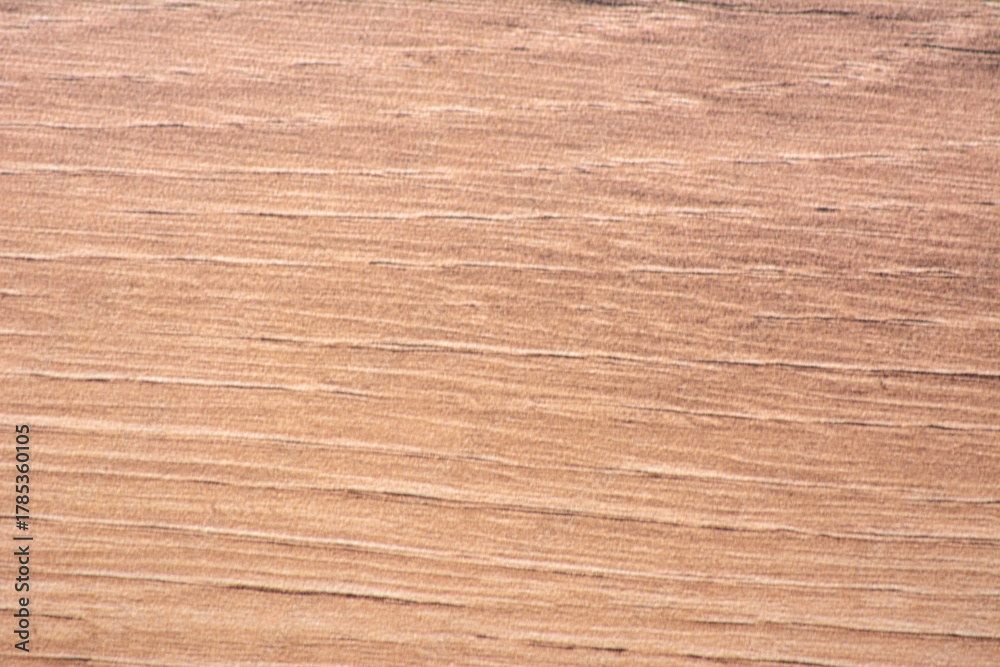 Naklejka premium Dark oak striped natural wood pattern close-up.