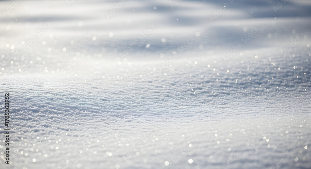 Obraz premium Shimmering texture of pristine white snow illuminated by crisp winter sunlight