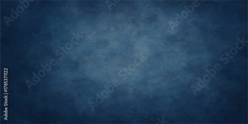 Dark blue grunge texture wall paper design with vintage chalk board surface and aged black pattern background