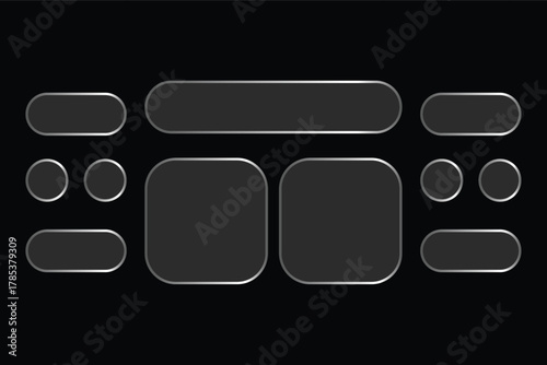 Sleek gray shapes shine brightly on a stark black background creating a modern abstract mood