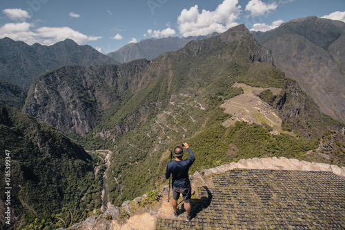 Man at the top of Huayanapicchu - Machu Picchu, Cusco Peru