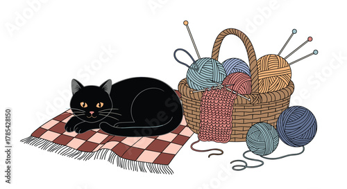 A charming black cat relaxes on a cozy checkered blanket beside a wicker basket filled with colorful knitting yarn and needles.