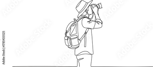 Photographer wearing a hat and backpack, capturing a moment with a camera, representing travel and exploration, isolated on white background