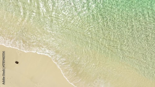 Nature of the ocean and blue sky Summer with sunshine, sandy beaches, clear blue waters sparkling against the blue sky. on an island with good ecology and environment Background for summer vacation