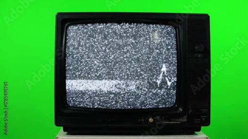 Vintage TV Interference with turned on and off static sound distortion, green screen overlay, glitch, noise, scan lines black background, 4k animated video loop
