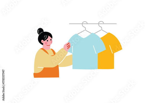 洗濯物を干す女性