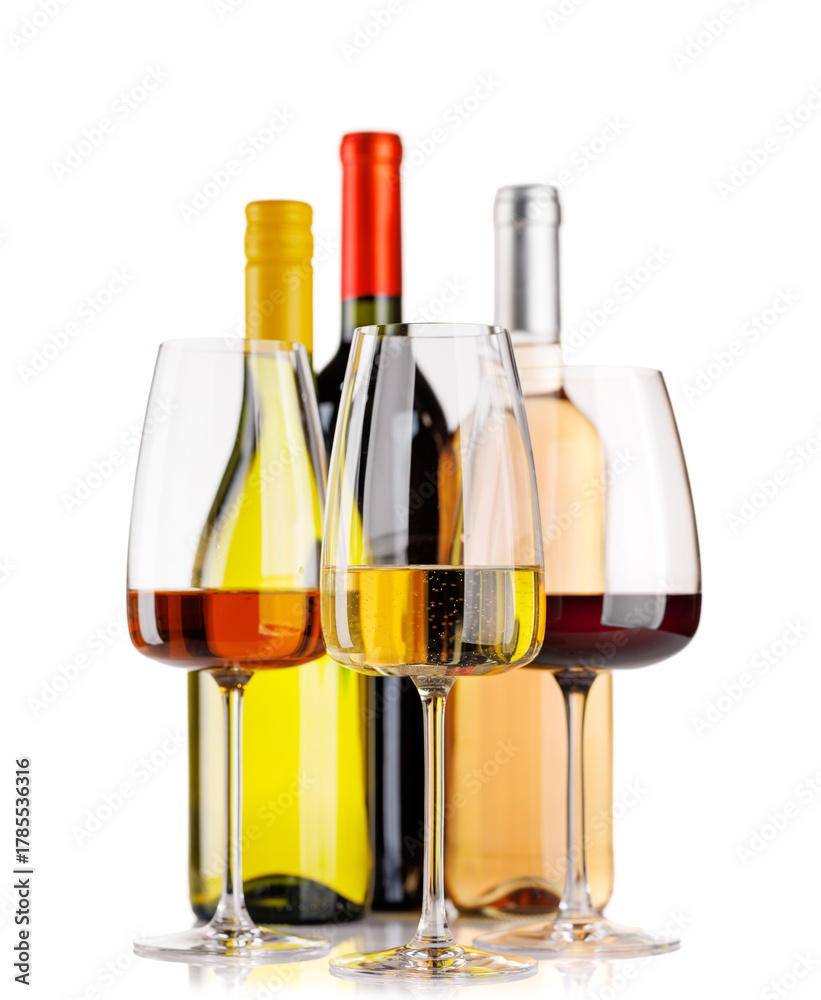 Naklejka premium Different wine bottles and glasses on white background