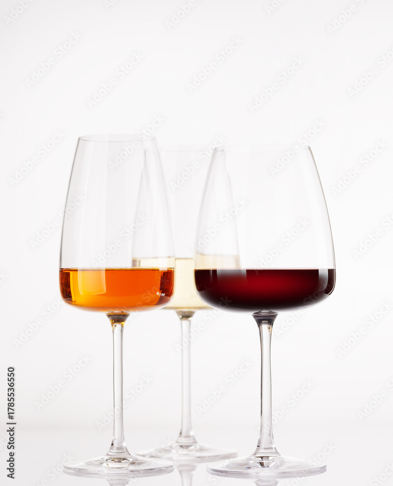 Naklejka premium Different wine glasses on white background